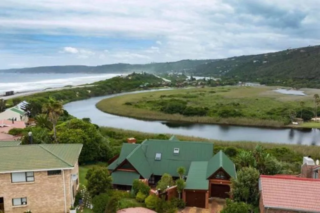 Lagoon, river, and beach vista from elevated property viewpoint